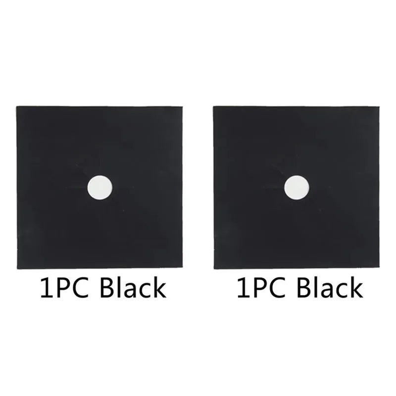 Two black stove burner mats with a circular hole each
