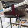 A close-up view of a heavy-duty control arm pry tool kit with a 1/2 inch drive adapter resting on a metal surface.