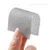 Roll of black self-adhesive window screen repair tape being held by a hand