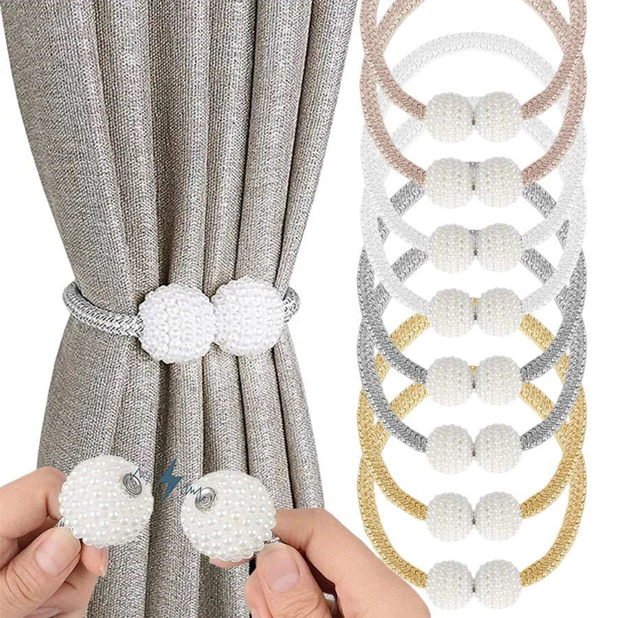Pearl magnetic curtain tiebacks with strong hold used to secure a gray fabric curtain.