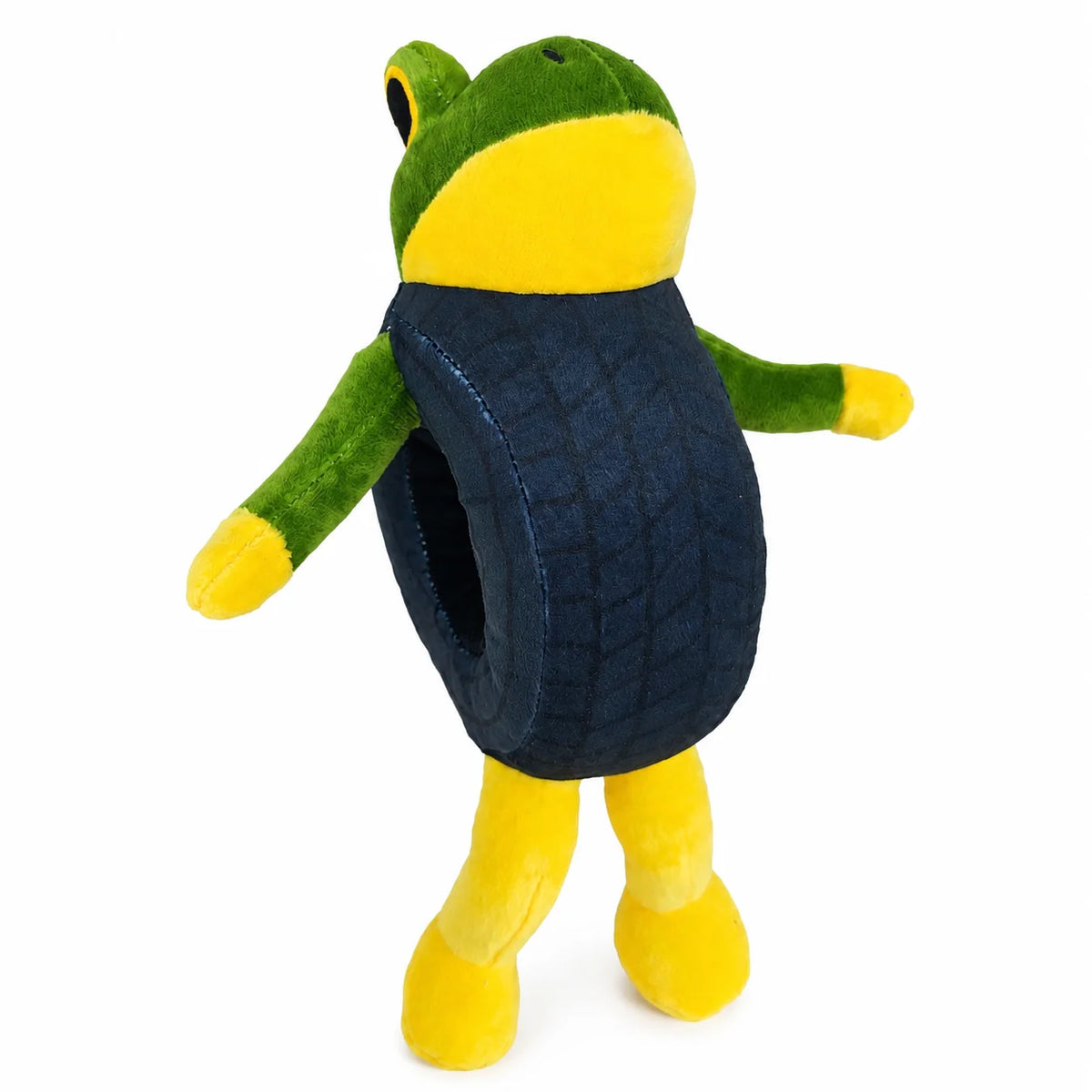 A plush toy of a shark with green and yellow body parts and a dark blue belly.
