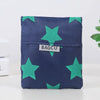 A dark blue fabric pouch patterned with bright green stars.