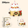 A set of 296 micro building blocks forming a cute dessert figurine with a white frosting, pink candle, and green accents.