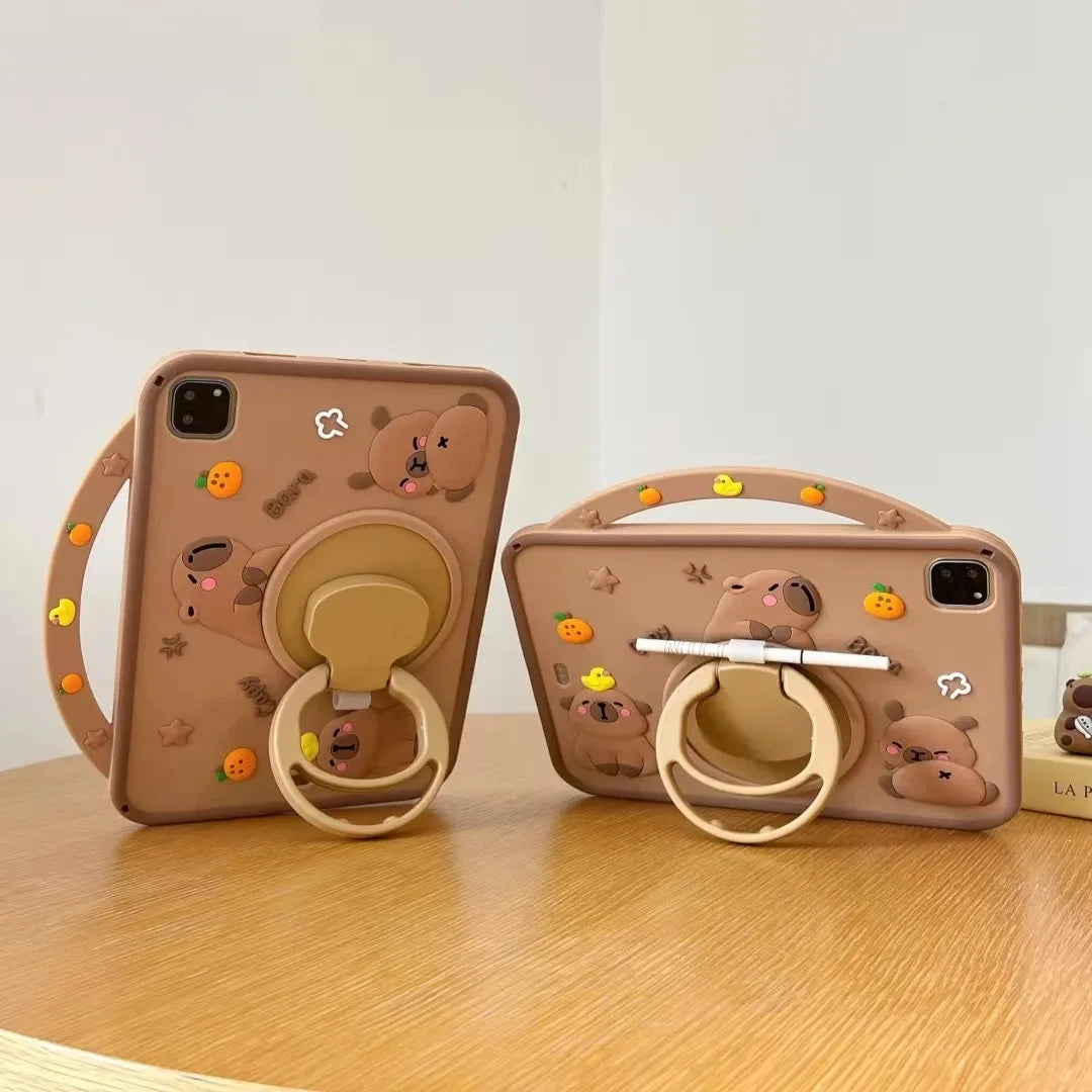 A tan silicone case featuring a cute cartoon capybara design for an iPad.