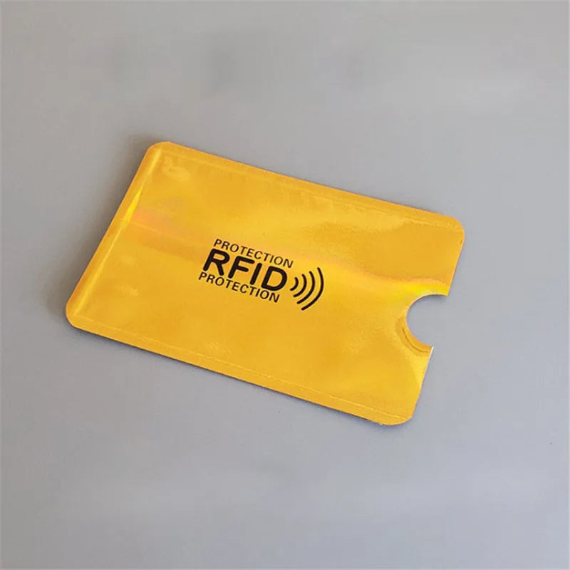 A yellow plastic card holder with the text Protection RFID Protection on it.