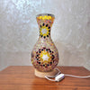 Handcrafted Turkish mosaic table lamp with warm LED glow featuring colorful glass pieces.