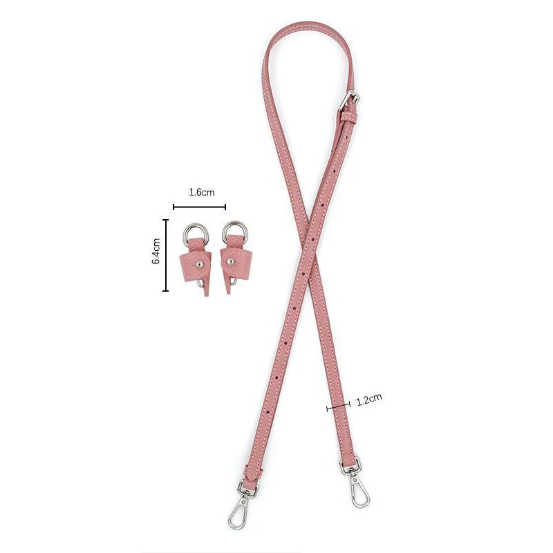 Pink leather shoulder strap for mini bags with adjustable length and clasp.