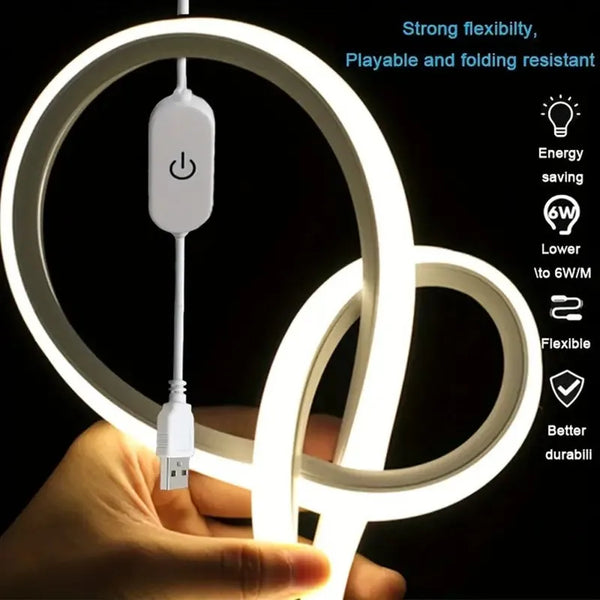 Una mano sostiene una tira de luz LED de neón de silicona flexible con regulador táctil, mostrando su flexibilidad y brillo.