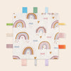 A white baby sensory tag comfort blanket featuring colorful rainbow patterns and clouds.