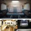 Interior view of a vehicle showing the Motion Sensor LED Night Light installed on the dashboard.