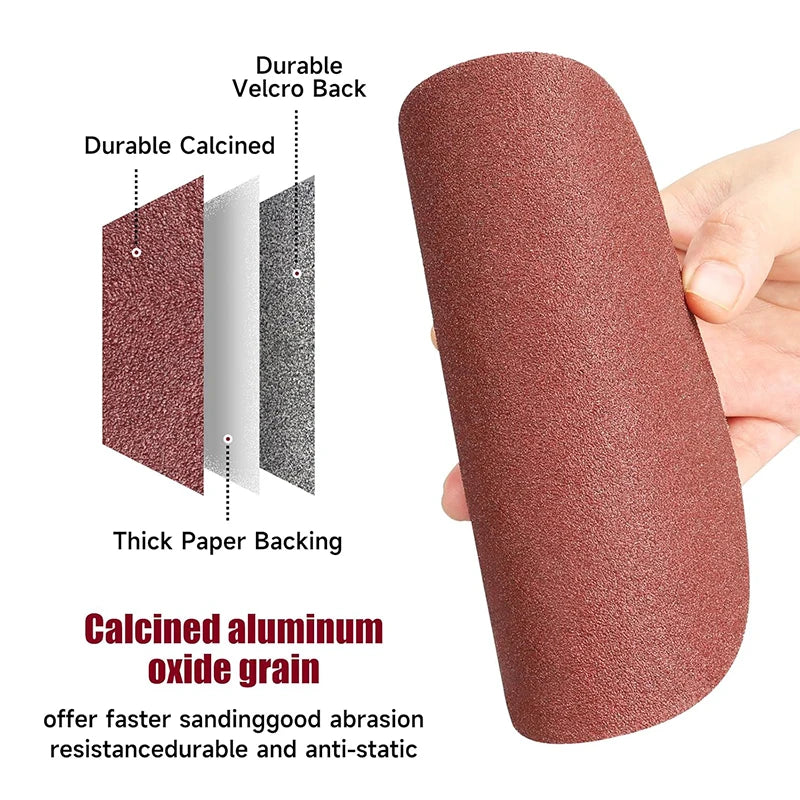 A hand holds a reddish-brown sanding disc with a durable velcro back and a calcined aluminum oxide grain.