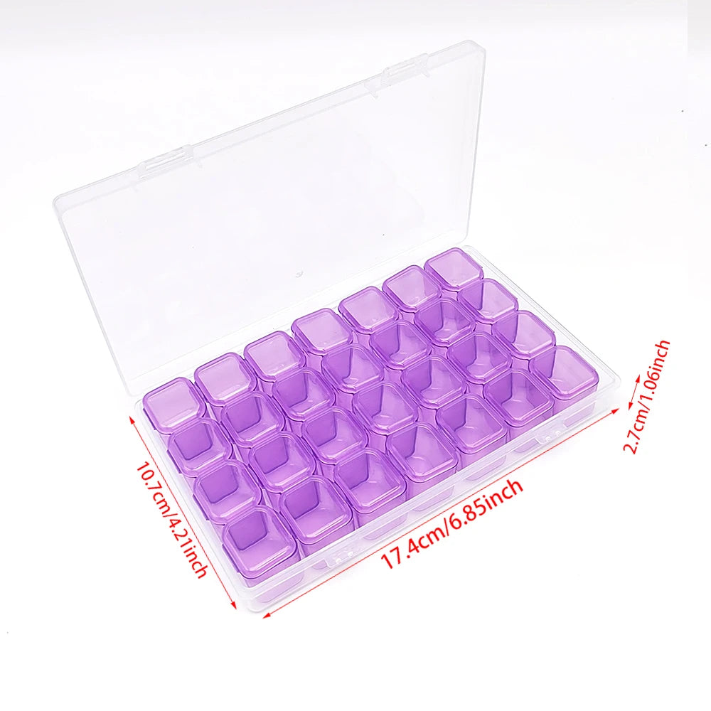 A clear plastic storage case containing numerous small purple diamond painting beads and tools.