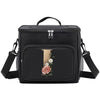 Black insulated canvas lunch bag with a gold accent and adjustable strap.