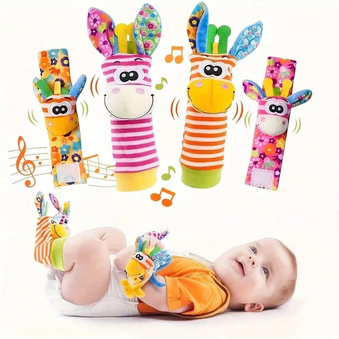 A set of colorful baby rattle socks and teether booties with sensory toys displayed above a sleeping baby.
