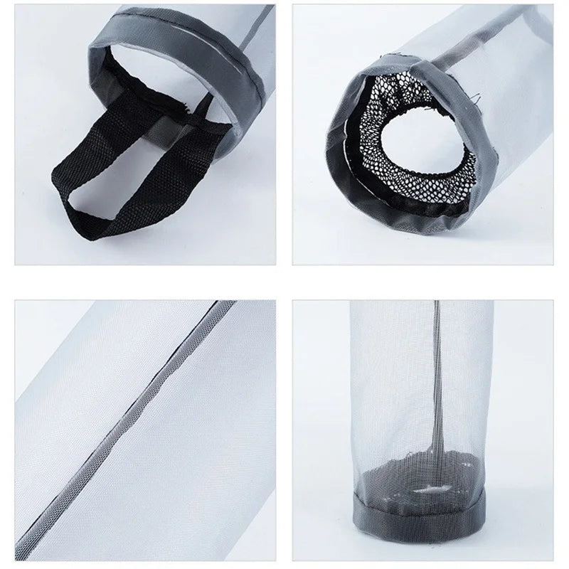 A wall-mounted plastic bag dispenser showing a black mesh opening and a clear plastic bag being dispensed.