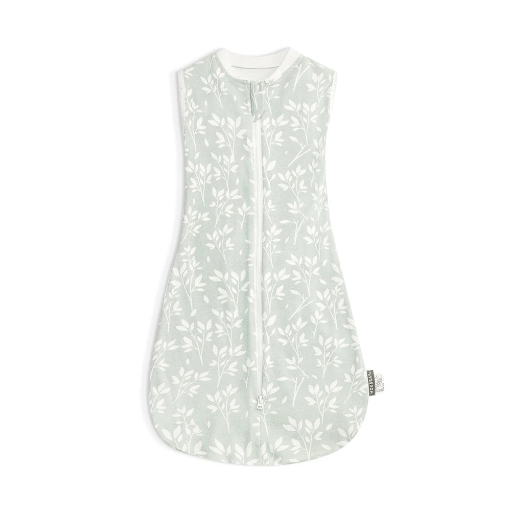A light green breathable cotton baby sleep sack with a zipper and delicate leaf pattern.