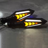 A pair of universal 12V motorcycle LED flowing turn signal indicators with yellow light visible.