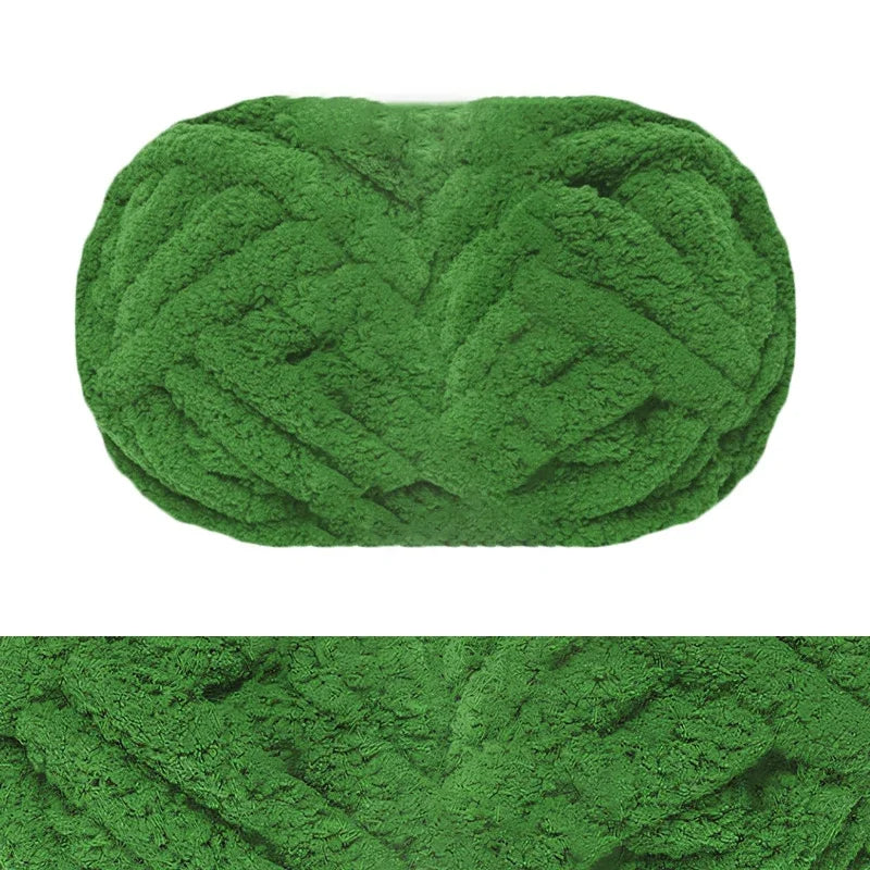 A ball of chunky green chenille yarn for hand knitting and crochet