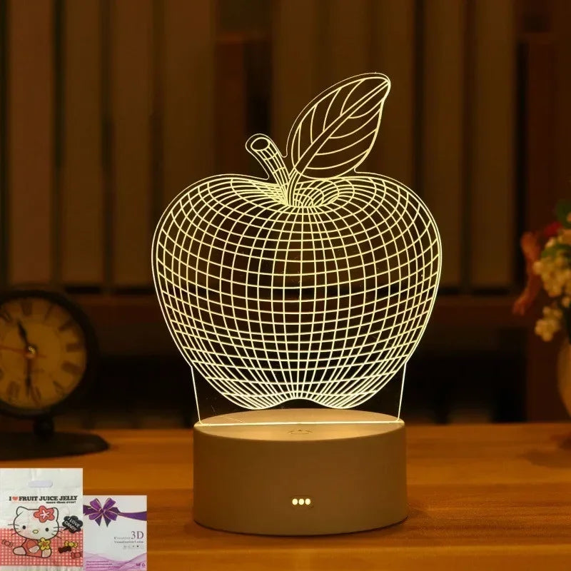 A white wireframe apple 3D illusion LED night light lamp sitting on a wooden table.
