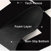 Cross-section view of a black kitchen drying mat showing layers including Tech Fleece, Foam Layer, and Non-Slip Bottom.