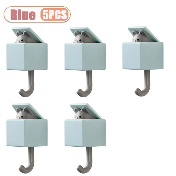 Five blue cartoon cat wall hooks with light blue square holders and silver hanging parts.