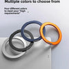 Four colored magnetic aluminum tablet holders displayed on a gray surface.