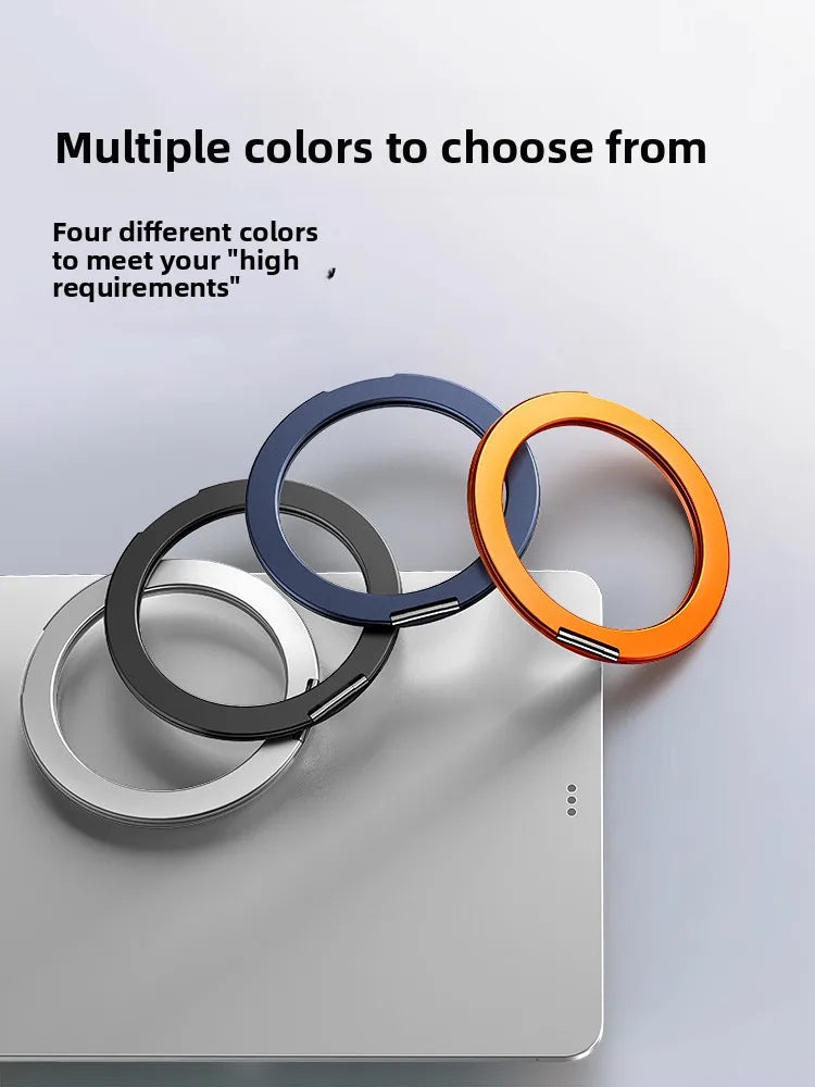 Four colored magnetic aluminum tablet holders displayed on a gray surface.