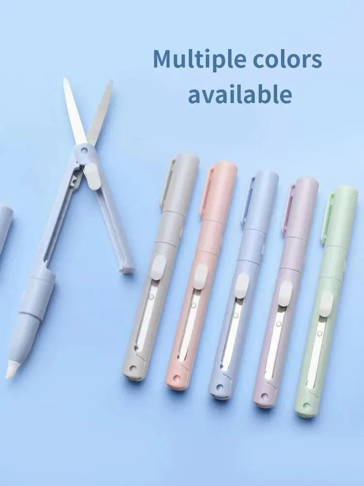 A collection of multiple colored mini pen-shape scissors and cutters displayed on a light blue background.