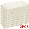 A stack of six beige raw-edge polyester cloth napkins folded neatly.