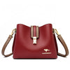 A maroon leather shoulder bag with a gold-toned clasp and strap is shown against a white background.