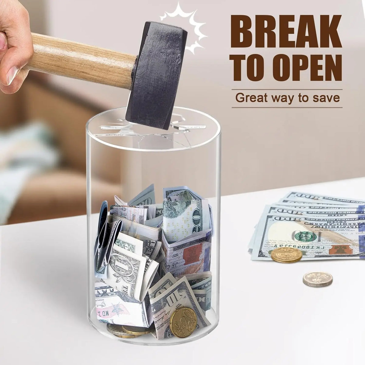 A hand uses a wooden tool to open a clear acrylic piggy bank filled with various coins and bills.