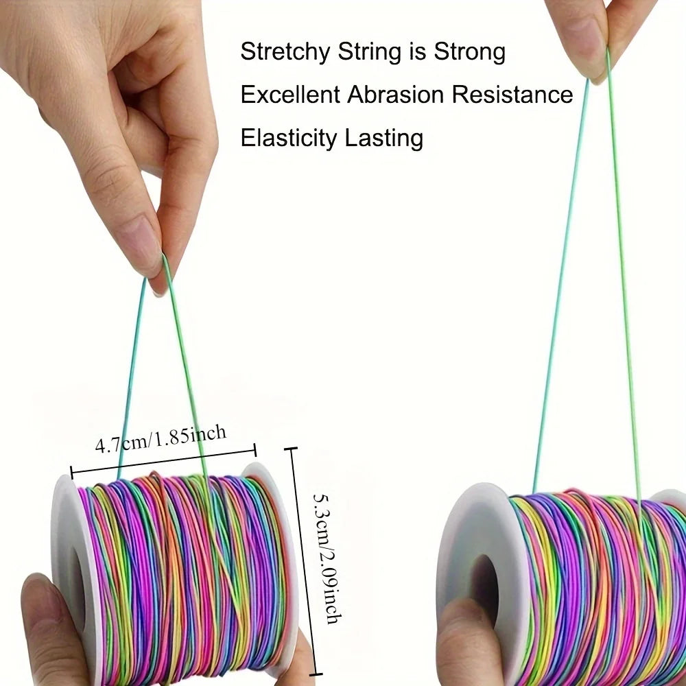 Hands hold a spool of stretchy rainbow elastic cord for jewelry making