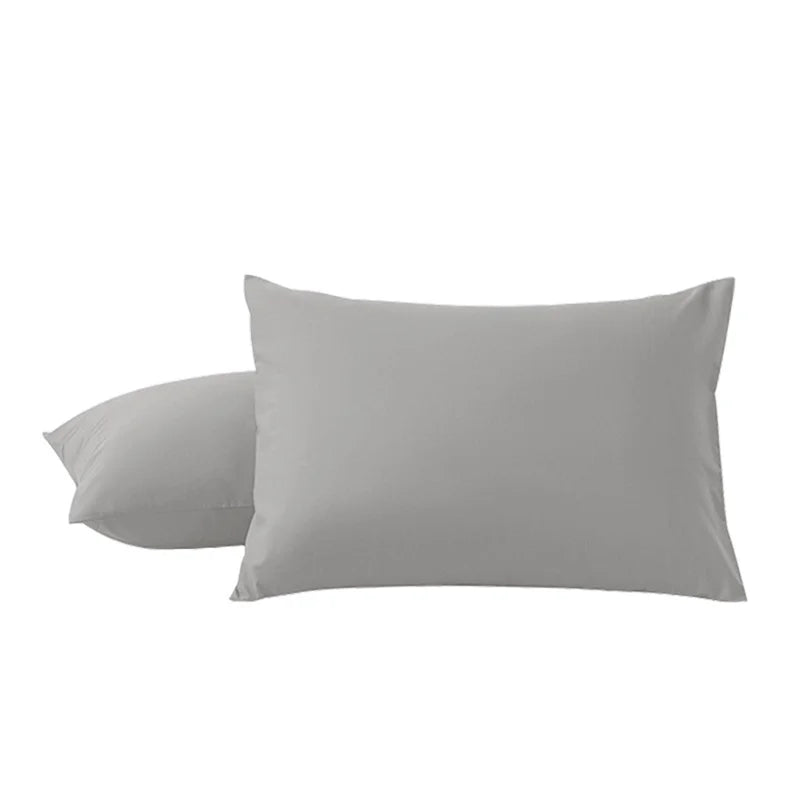 A pair of solid gray soft microfiber pillowcases with envelope closure.
