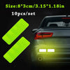 Ten reflective yellow safety strips for car visibility, shown against a dark car body.