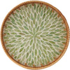 Handcrafted rattan serving tray with mother of pearl inlay featuring a repeating leaf pattern.