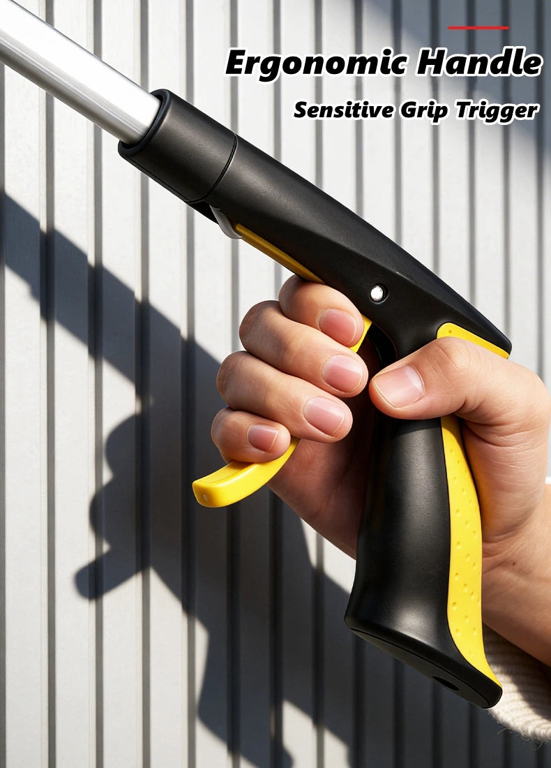 A hand grips an ergonomic black and yellow handle of a sensitive grip trigger tool with a silver shaft.