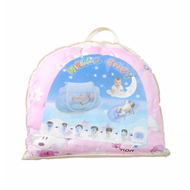 Pink portable crib mosquito net with a pillow and cotton pad featuring a baby sleeping on a moon background