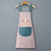 A light pink waterproof kitchen apron with a teal pocket and a deer face design is hanging on a wooden hanger.