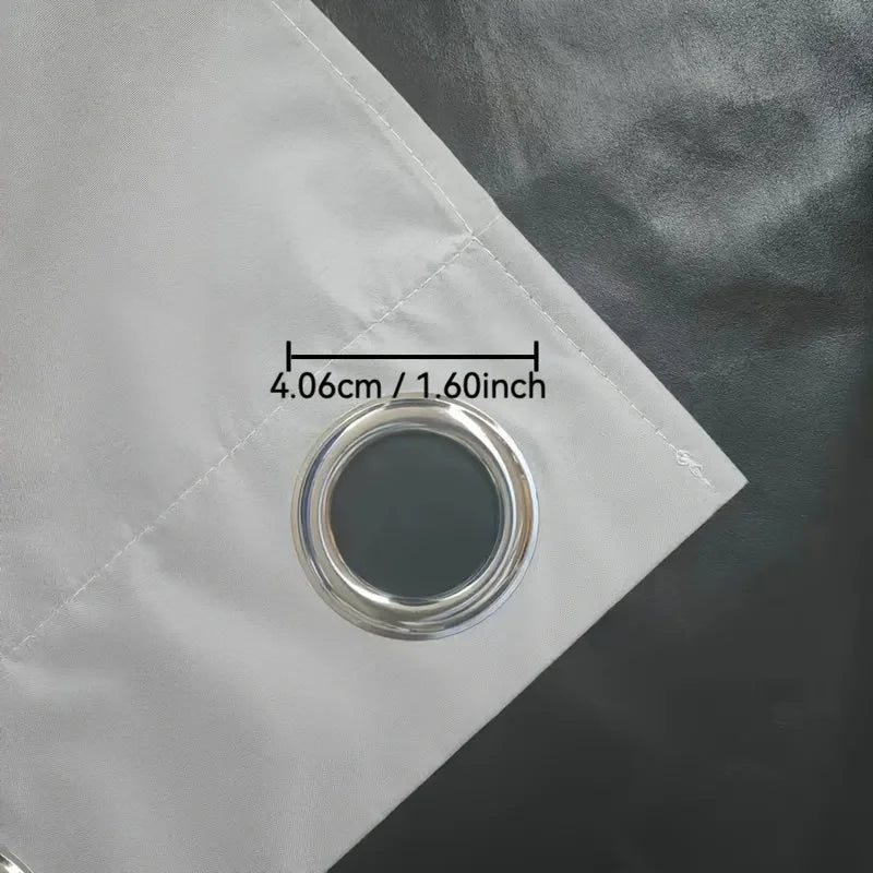 A white blackout curtain panel with a circular grommet showing the dimensions 4.06cm or 1.60inch.