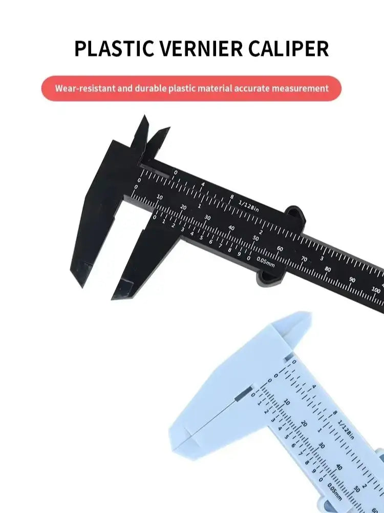 A plastic vernier caliper tool showing a scale for accurate measurement.