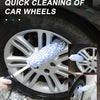 A hand is using an ultra-soft microfiber wheel cleaning brush set with a glove to clean a car wheel.