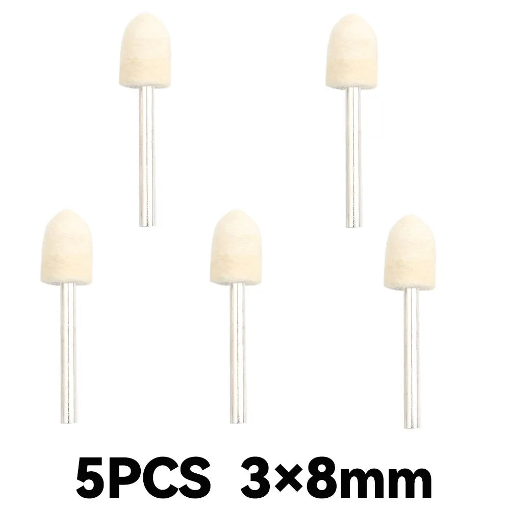 Five natural beige wool felt polishing wheels with 3mm metal shanks.