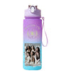 A purple sports water bottle with a clear lid featuring the name KATSEYE and several female figures.