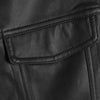 Close-up of a black faux leather biker vest showing stitching and a flap pocket detail.