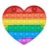 A heart-shaped rainbow colored pop bubble fidget toy with multiple colored bubbles.