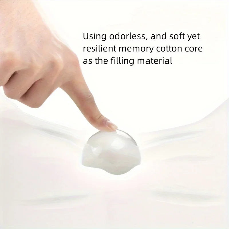 A hand is pressing a white memory foam core material into a soft, curved surface.