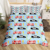 A blue duvet cover set featuring a repeating pattern of police cars and fire engines on a light blue background.