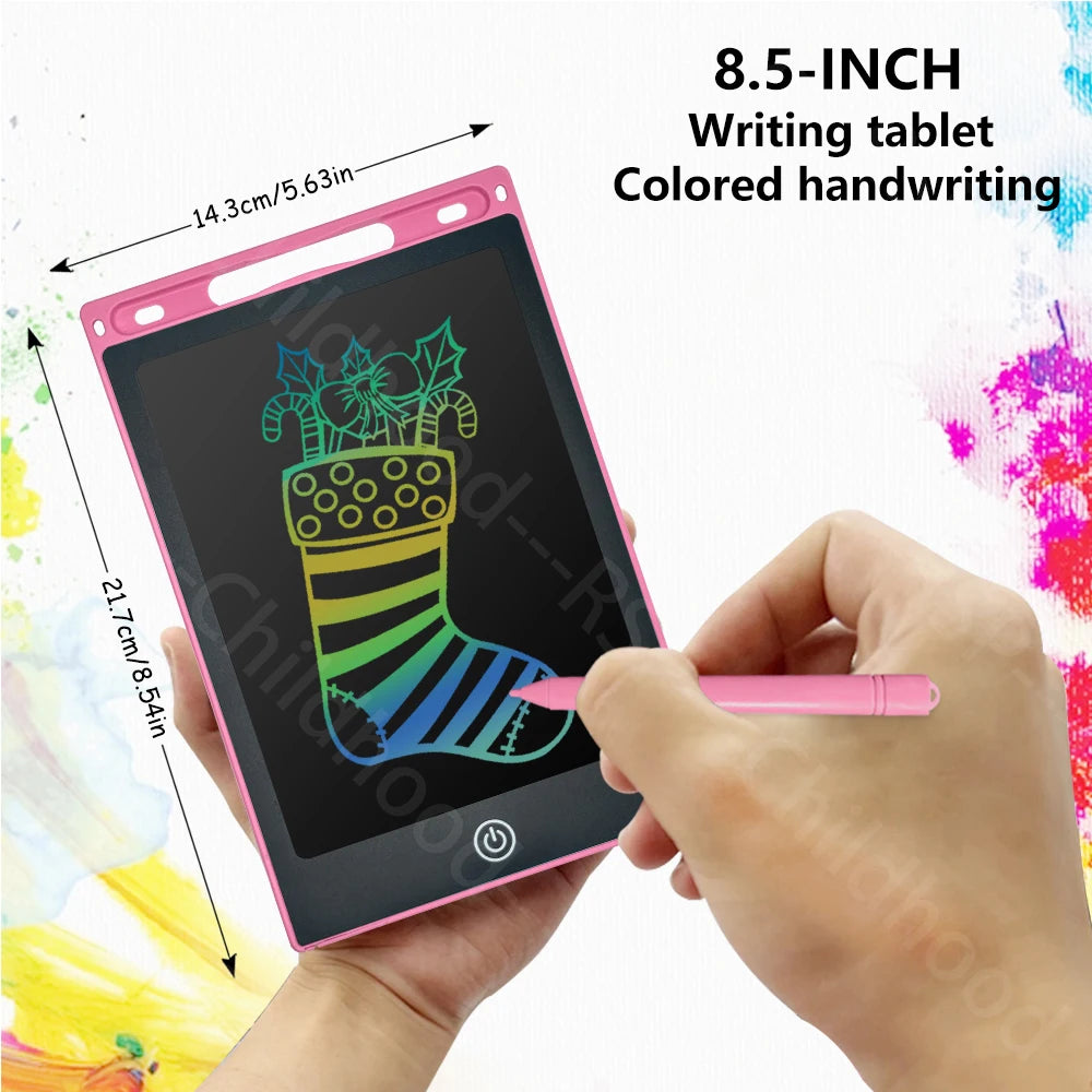 A hand holds an 8.5-inch pink LCD writing tablet displaying colorful handwriting on a black screen.