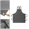 A dark gray canvas apron with large front pockets and leather-look straps is shown in detail.