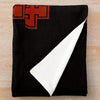 A black knit throw blanket featuring a red NFL team logo design.